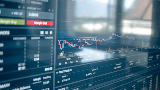 A person looking at a mountain range, symbolizing the long-term view of a financial investment journey
