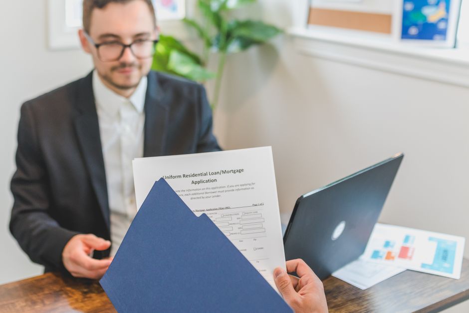 Reviewing monthly bills at a table
