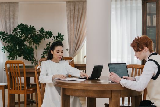 Microsoft 365 pricing tier comparison table displayed on desktop monitor