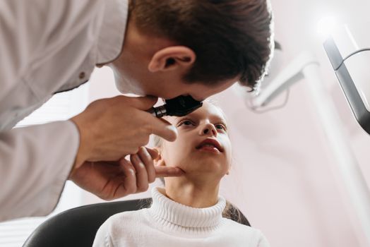 Doctor performing a thyroid exam