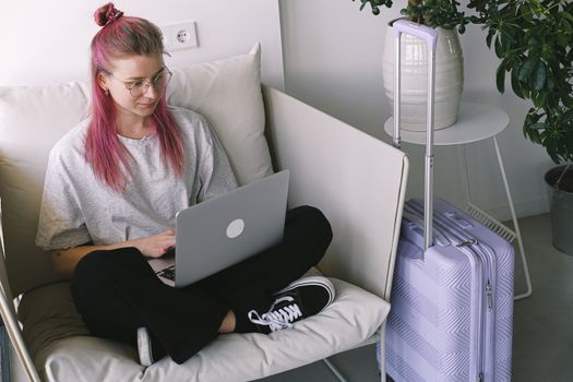 laptop showing health insurance documents on desk